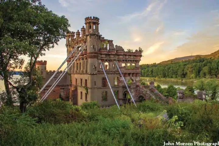 a building with a grassy field