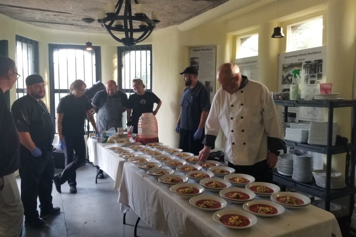 a group of people performing on a counter