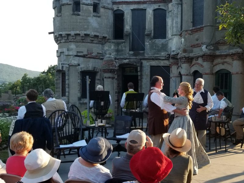 a group of people standing in front of a building