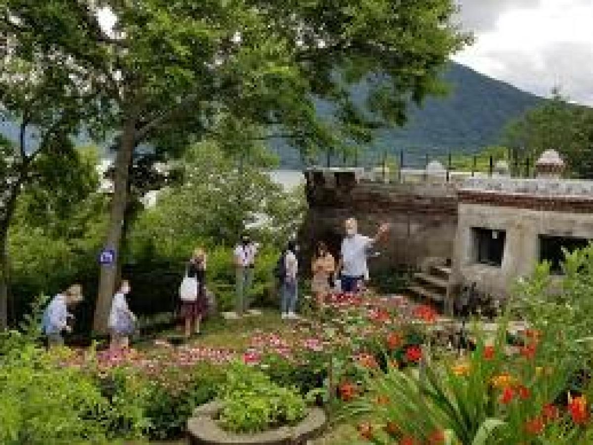 a group of people in a garden