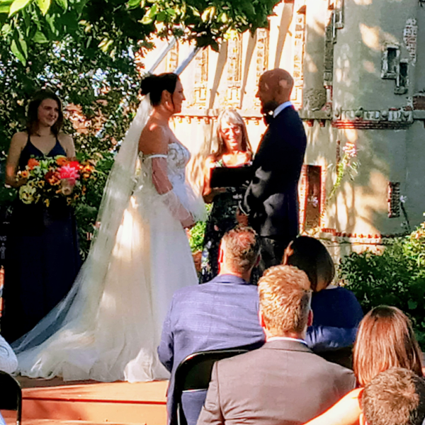 a group of people standing in front of a building