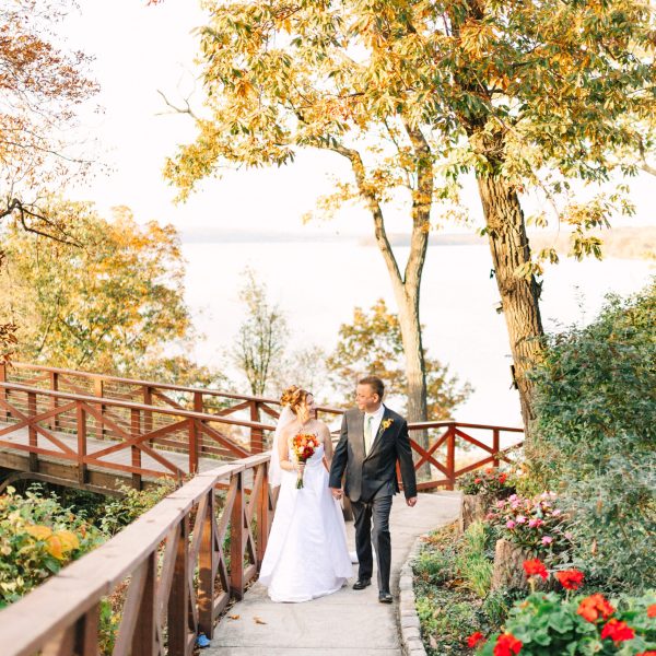 a man standing next to a tree