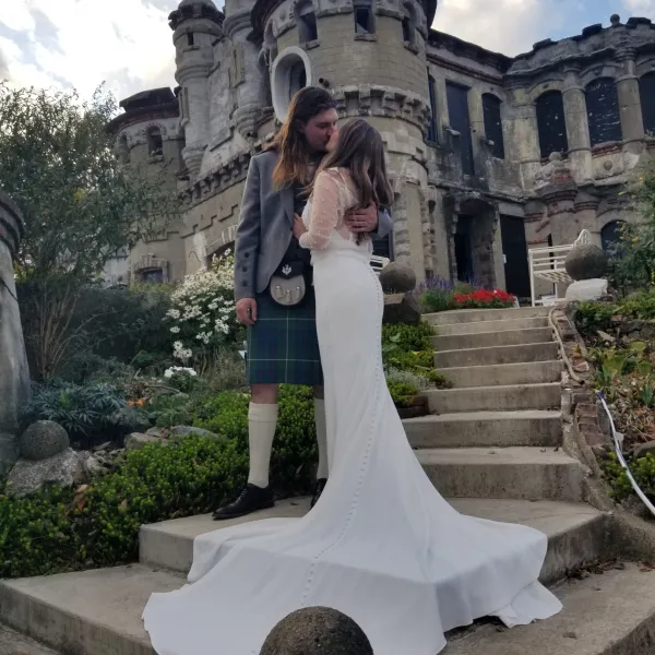 a person standing in front of a statue