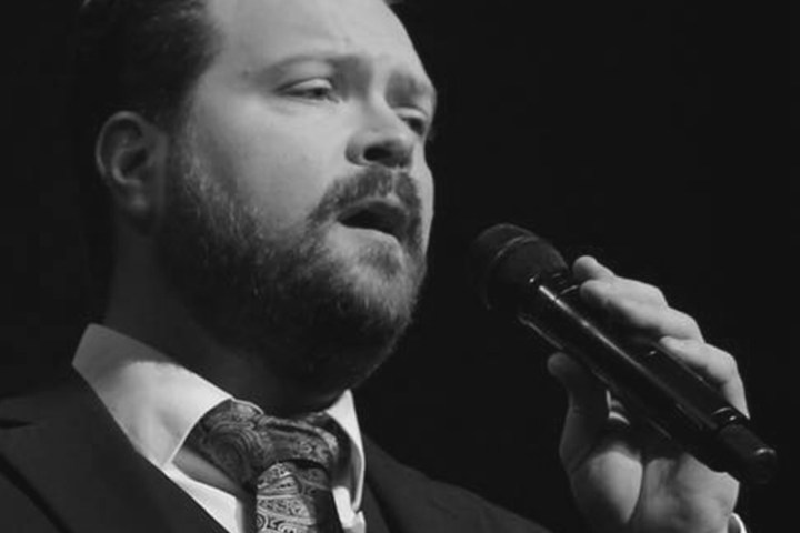 a man wearing a suit and tie