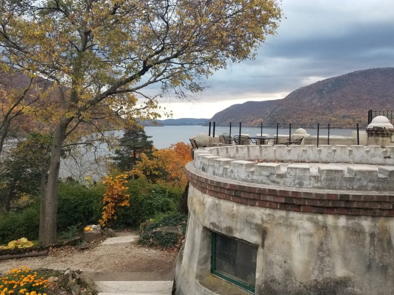 a stone bridge over a river