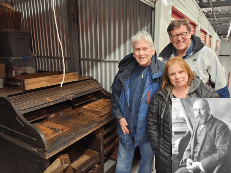 a person standing in front of a group of people posing for the camera