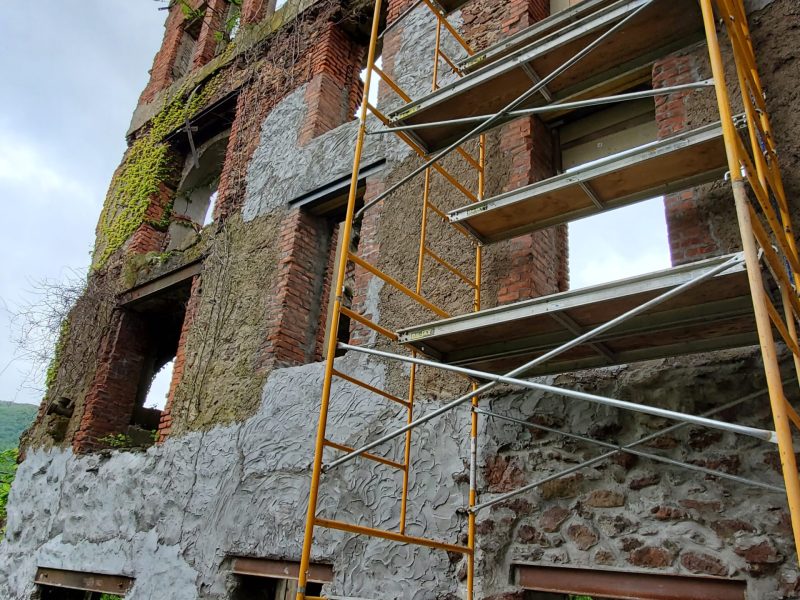 a close up of a brick building