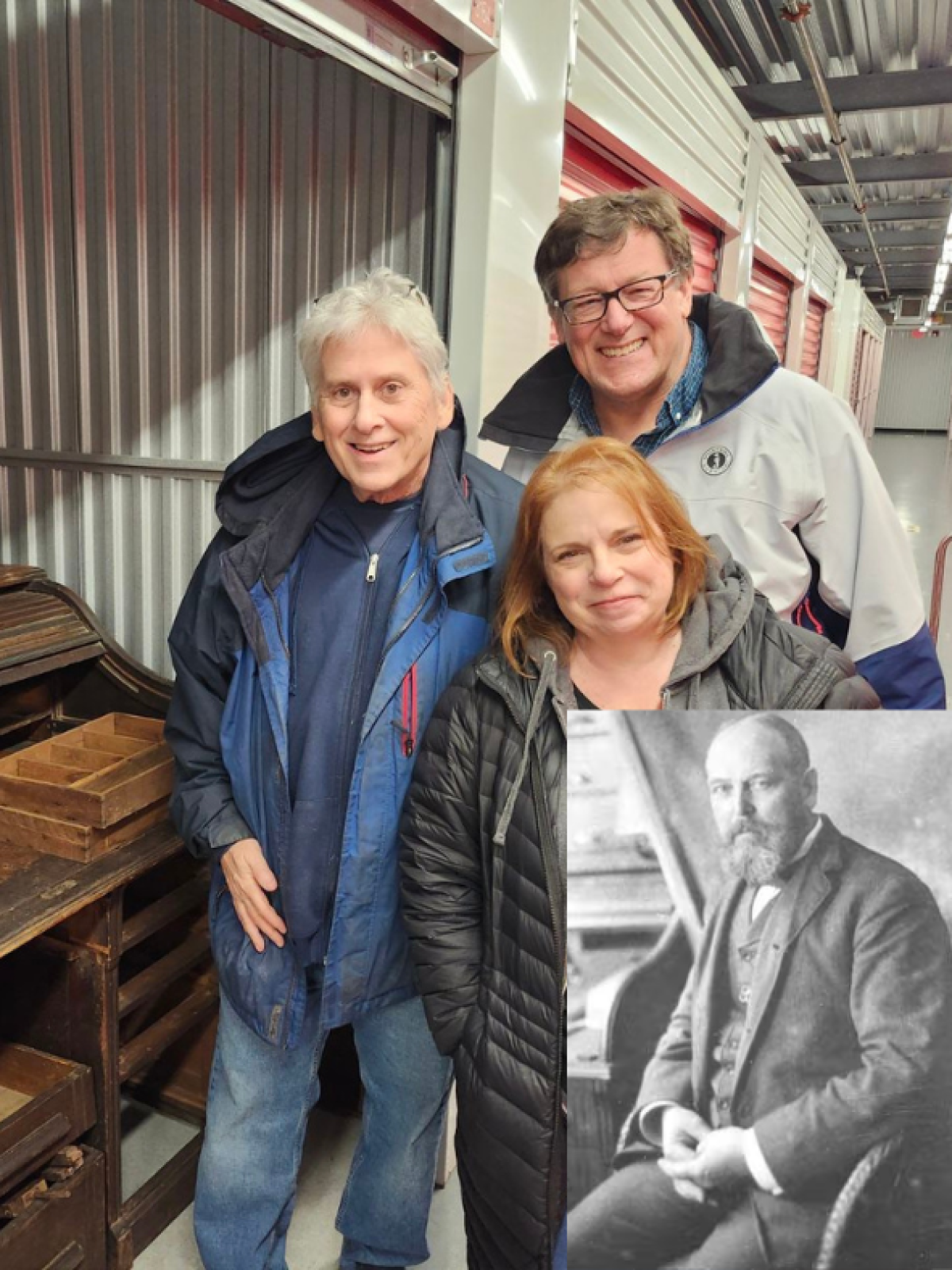 a person standing in front of a group of people posing for the camera