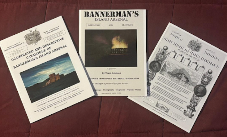 Three catalog covers about Bannerman's Island Arsenal on a red surface.